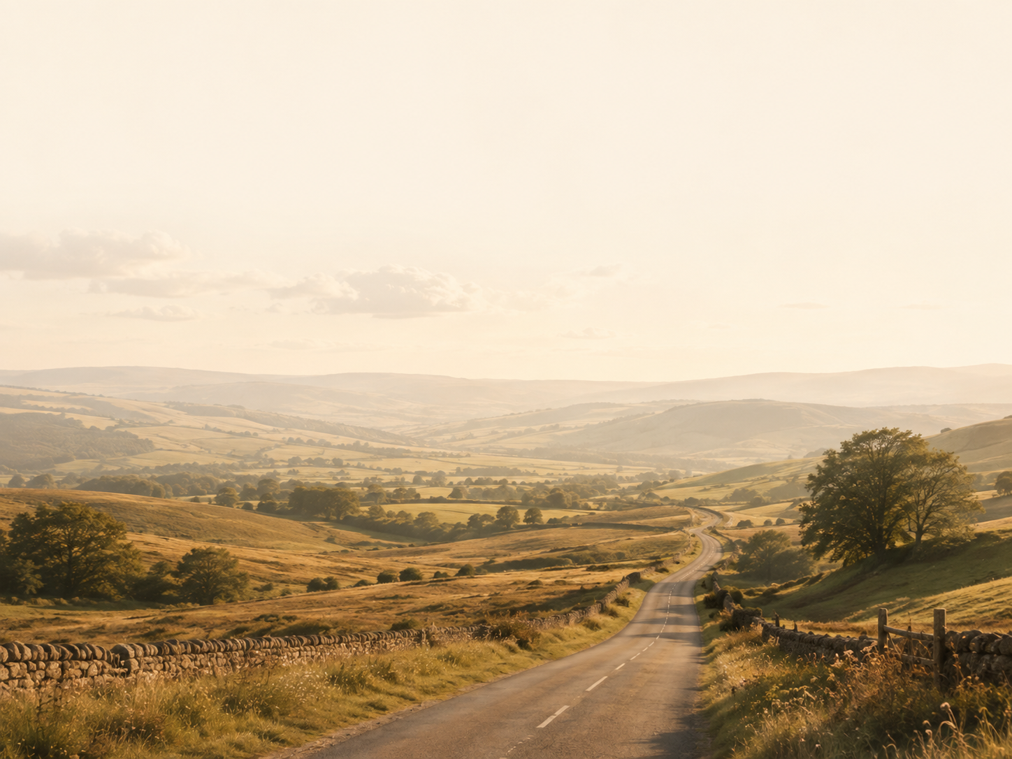 Open road across golden hills